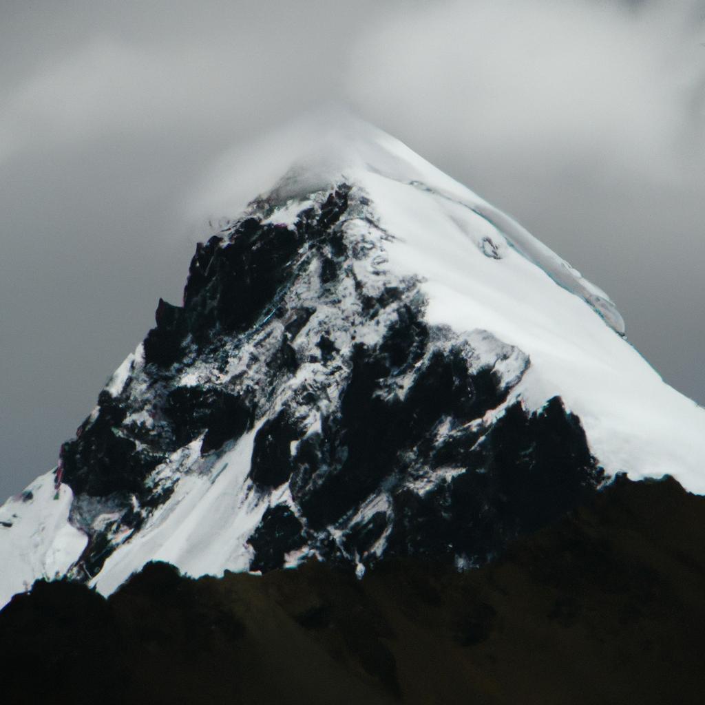 The Andes Mountains are known for their towering snow-capped peaks, which provide a stunning contrast against the blue sky