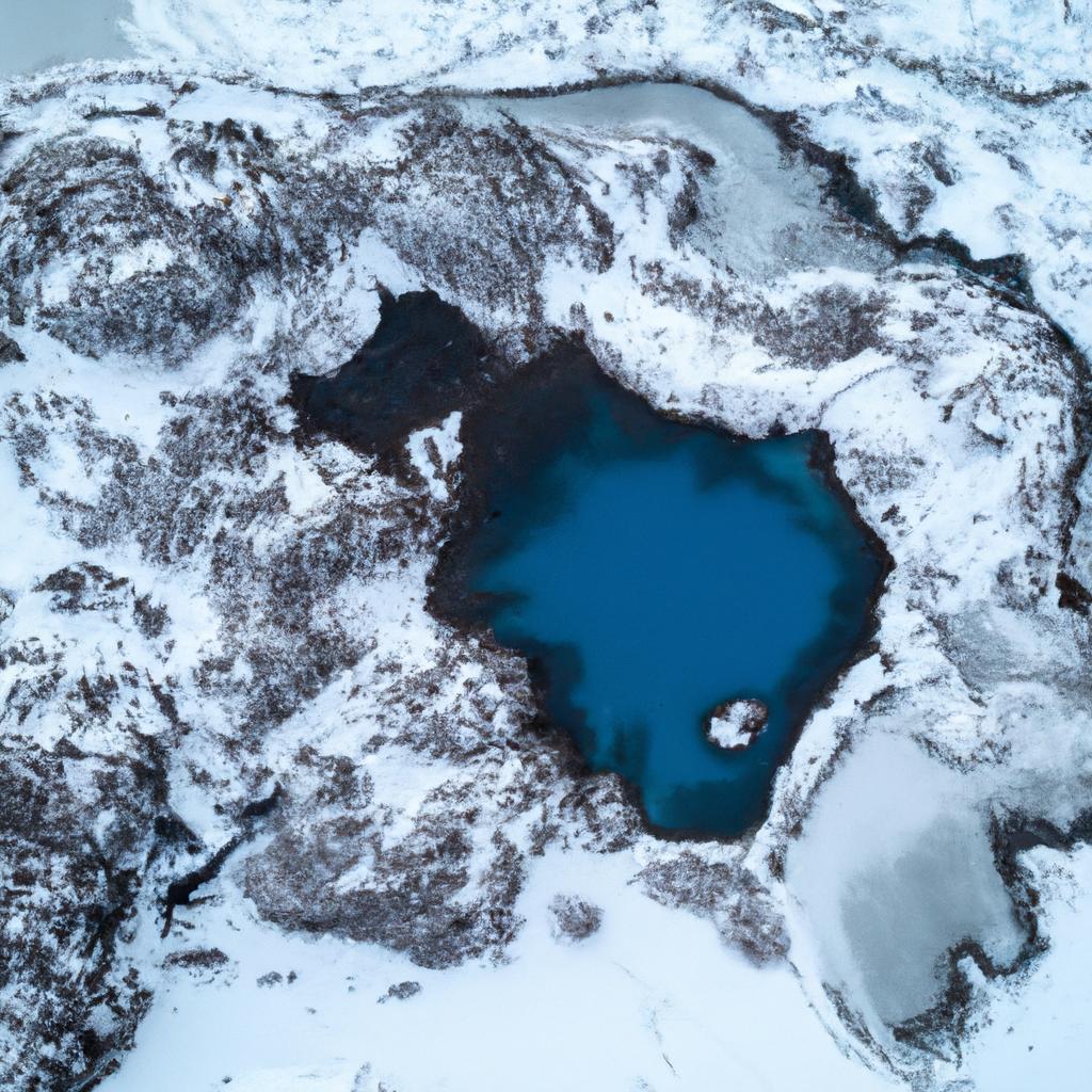 The Blue Lagoon's azure waters stand out against the white winter wonderland of Iceland.