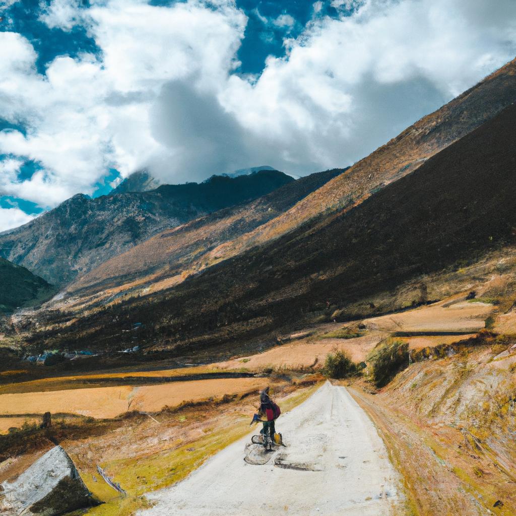 Cyclist riding through the beautiful landscape of Gangtey Valley