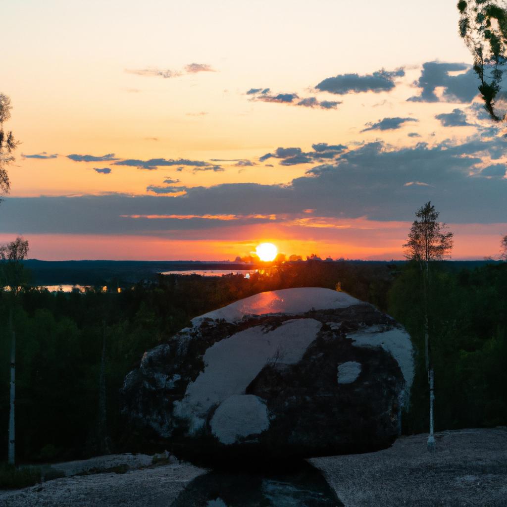Kummakivi Balancing Rock basks in the warm glow of the setting sun
