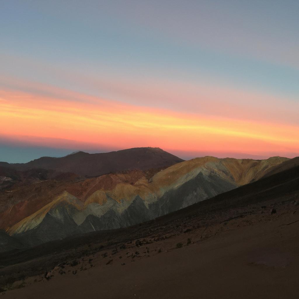 Witness the vibrant colors of the Rainbow Mountains at sunset