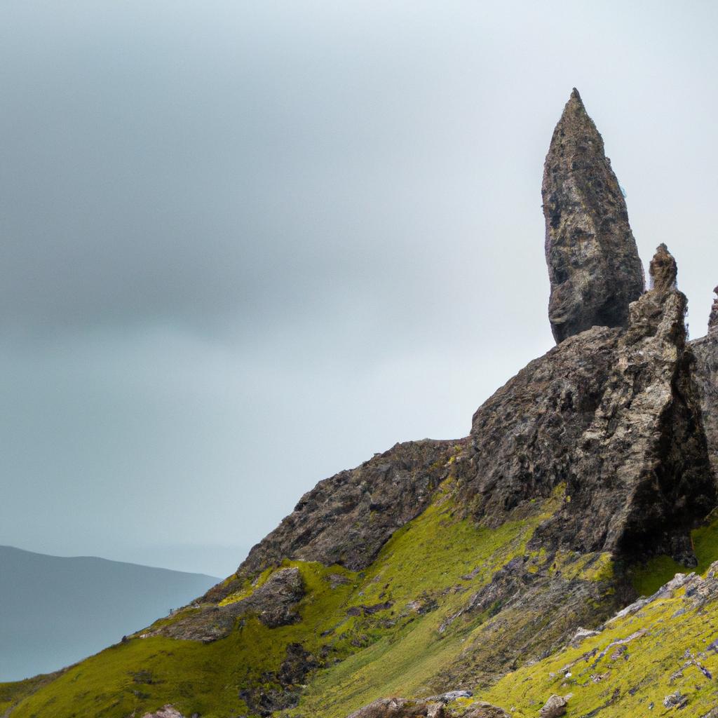 The iconic silhouette of the Old Man of Storr against the sky.