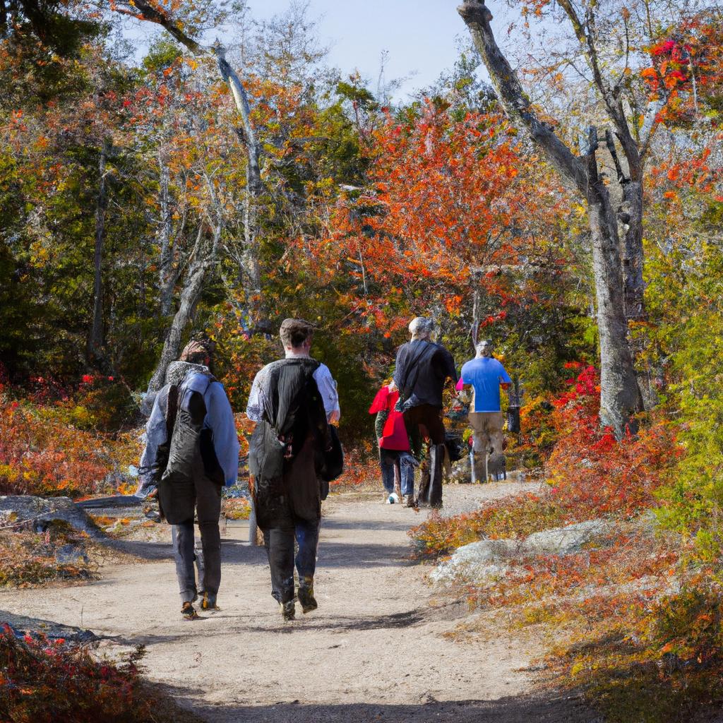 Hikers enjoying the fall colors in Acadia National Park