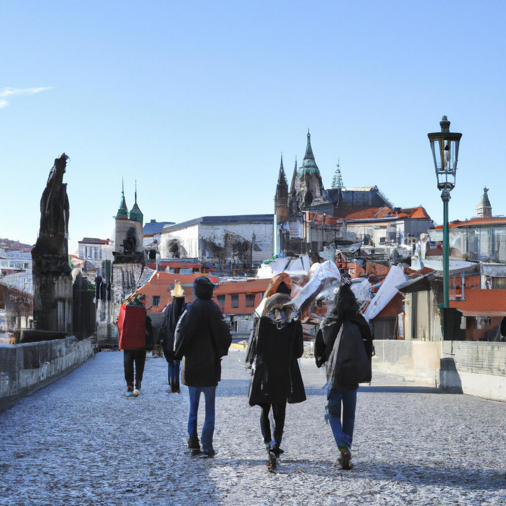 Tourists walking on the iconic Charles Bridge in Prague