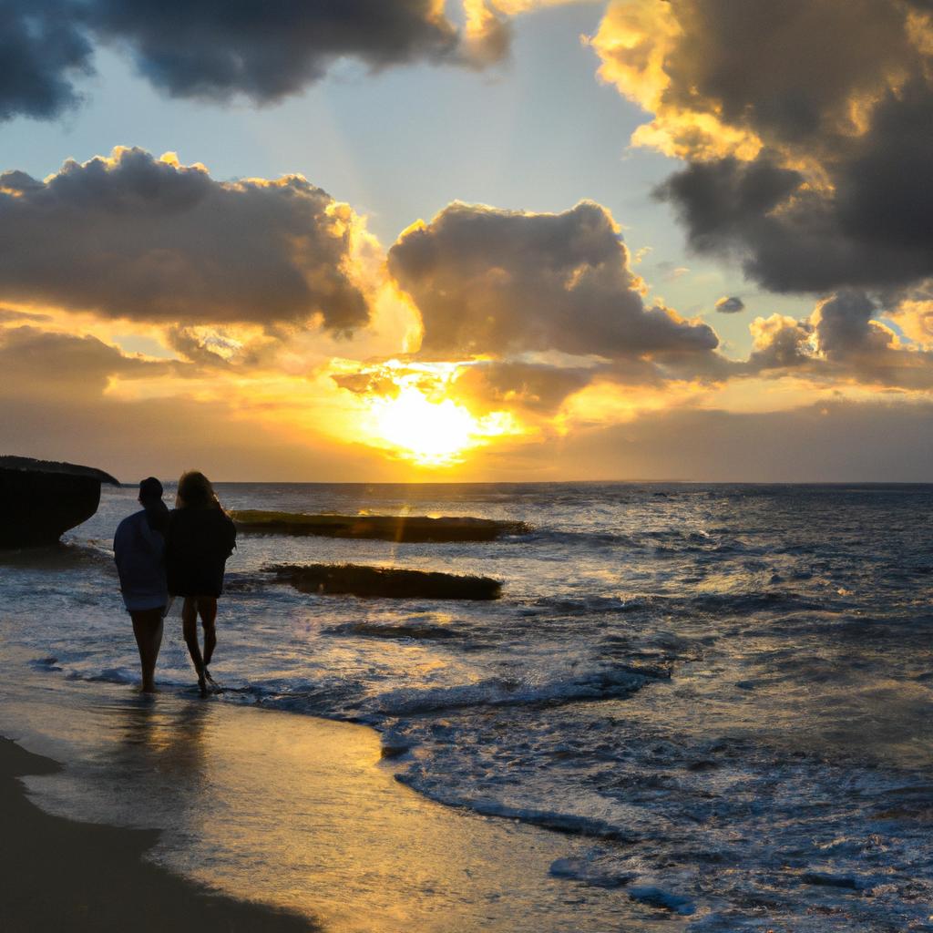 A couple taking a romantic walk along the shore during sunset on Shipwreck Beach