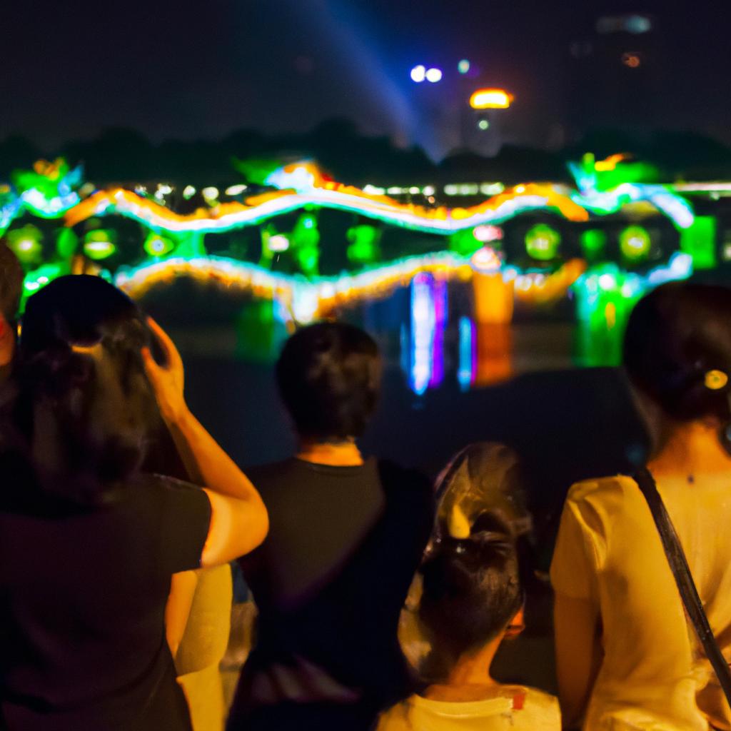 Tourists from all over the world gather to experience the mesmerizing light show on Dragon Bridge in Danang