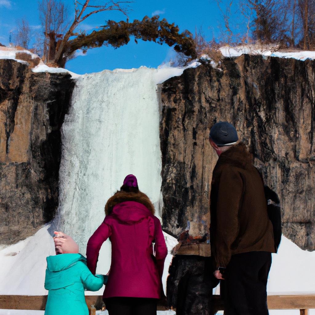 A happy family enjoying the breathtaking view of a frozen waterfall in Minnesota on a winter day