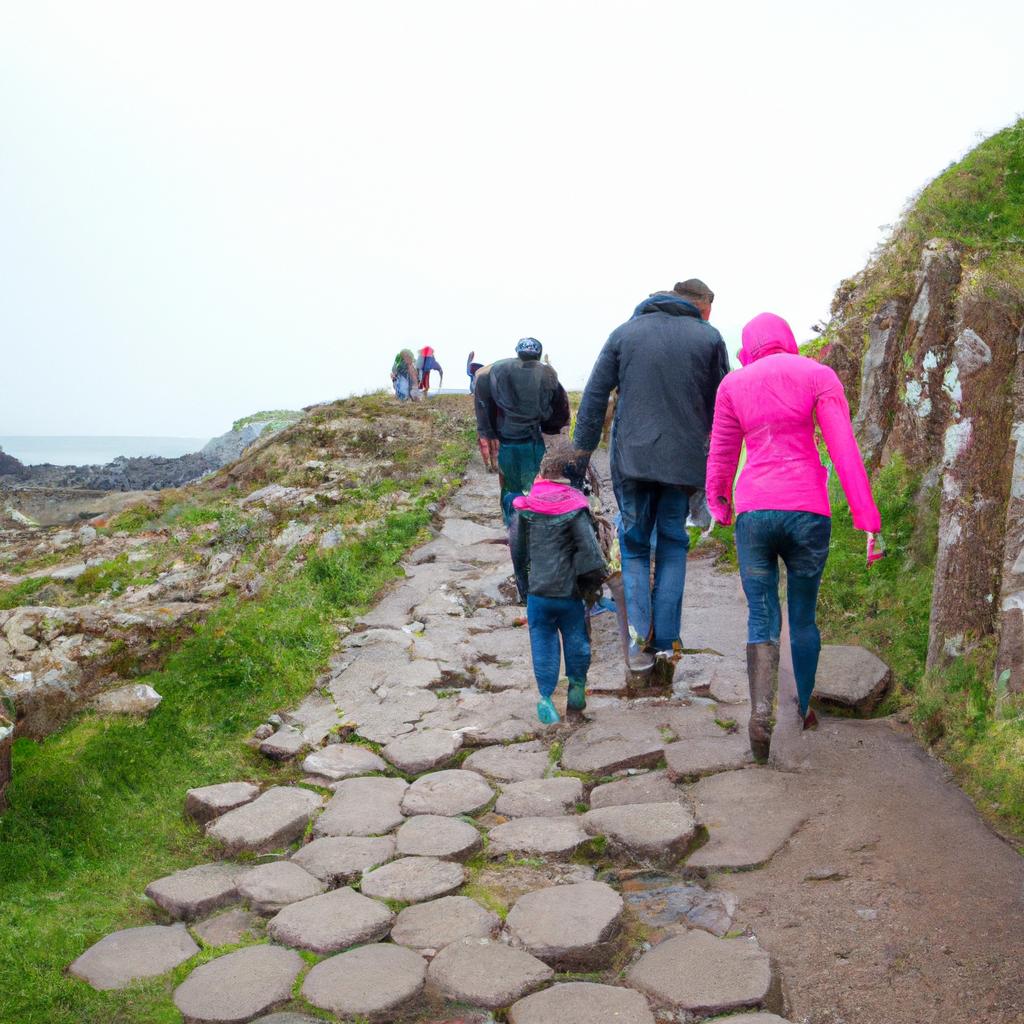 A family exploring the unique rock formations of Giant's Causeway