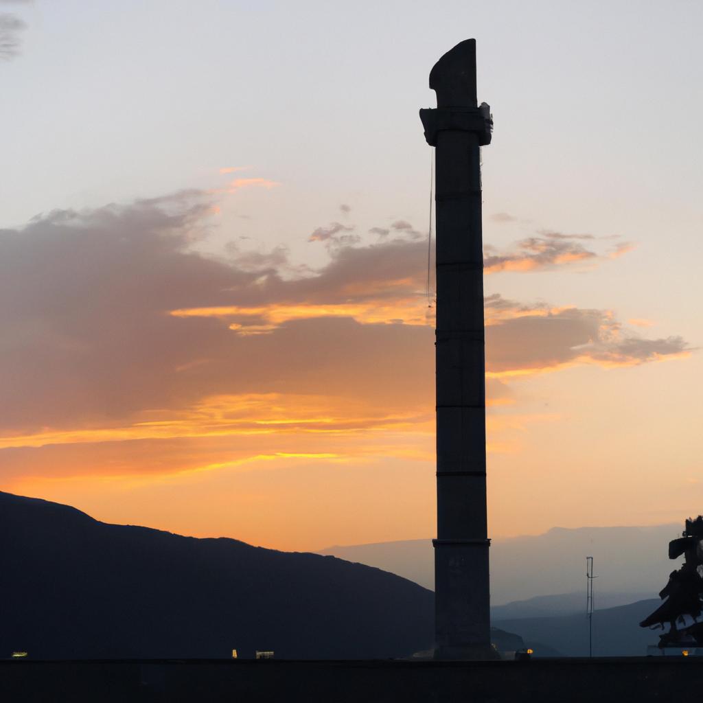 As the sun sets behind it, the Georgia Pillar takes on a serene and majestic quality.