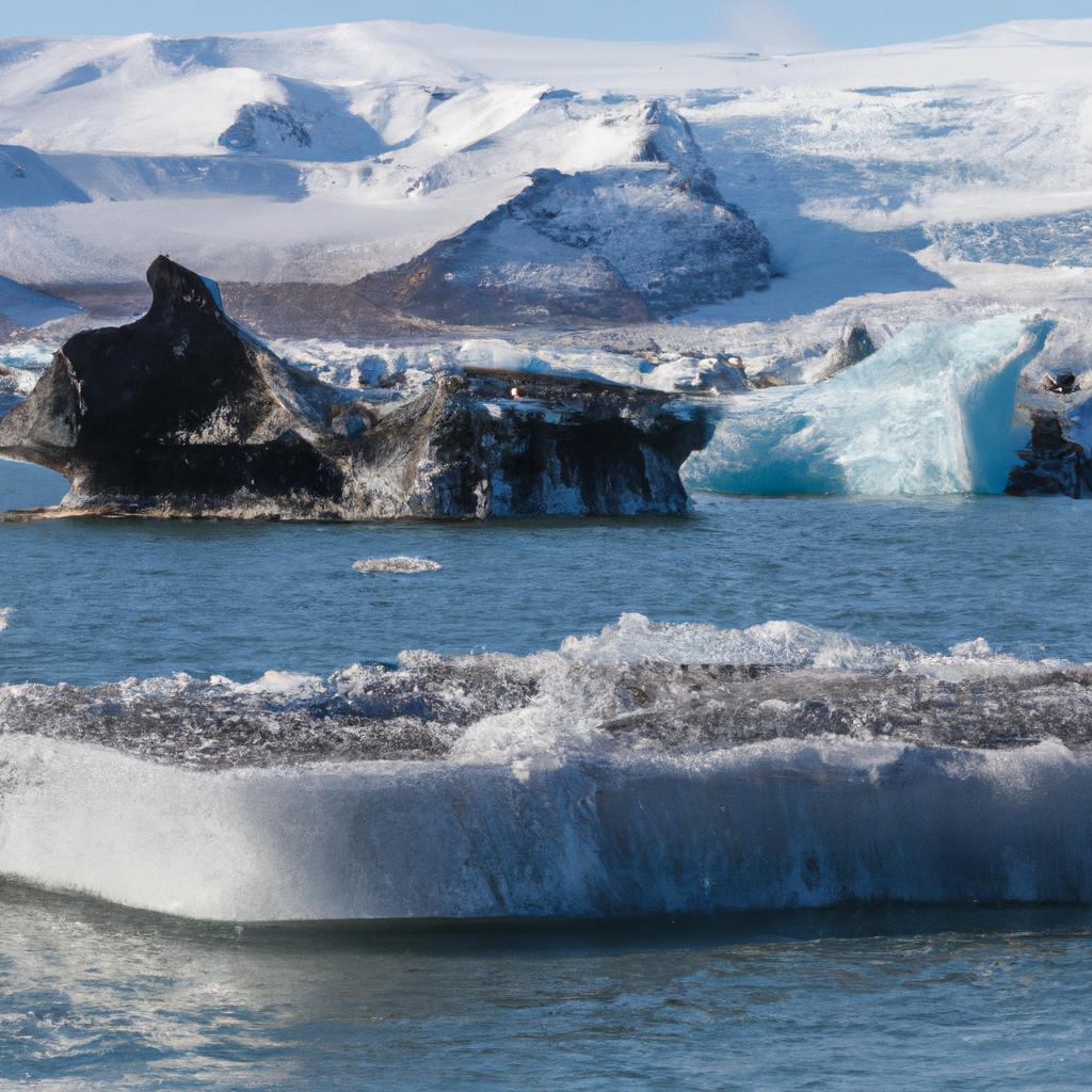 Witnessing the power of nature as a glacier calves in the Jokulsarlon Glacier Lagoon.