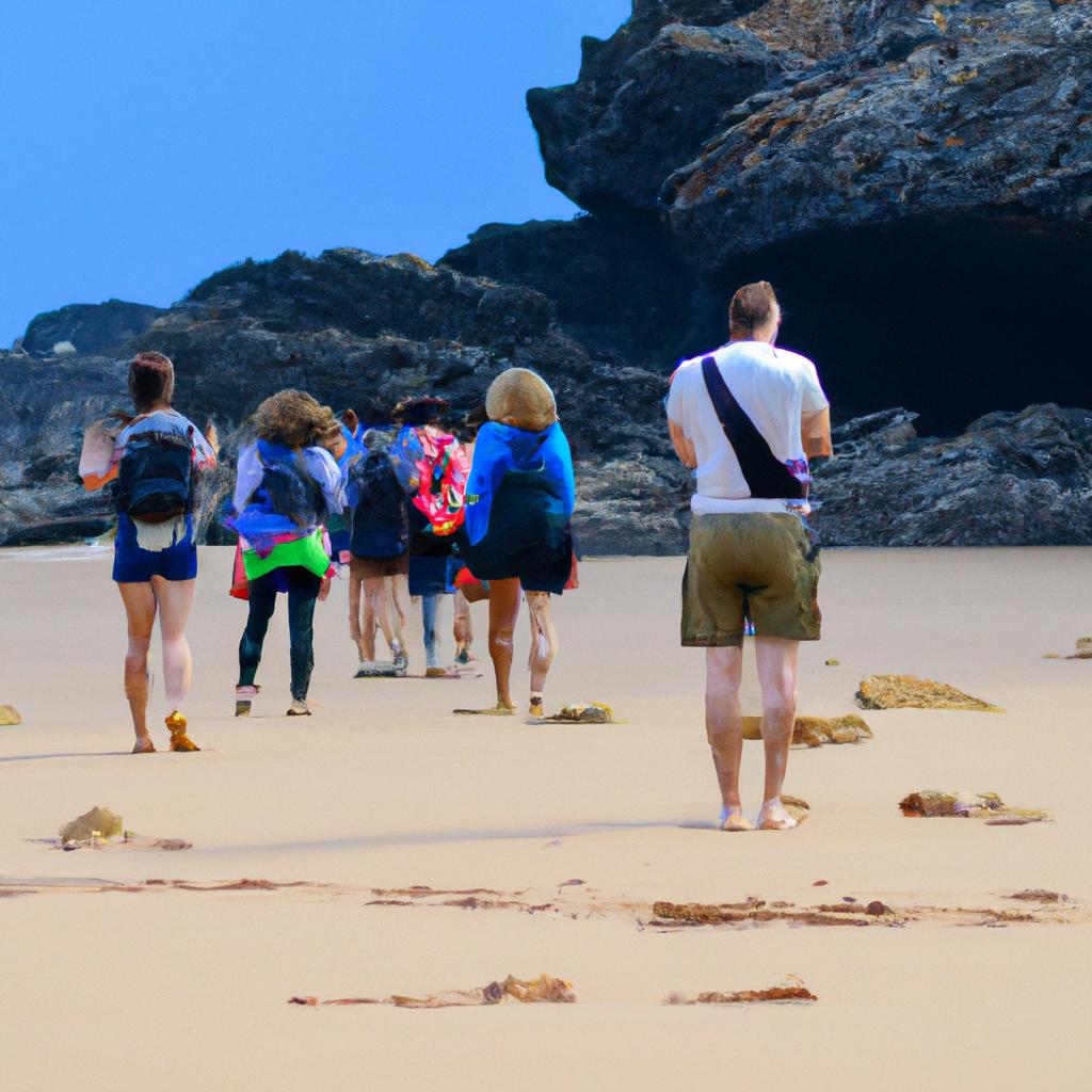 Tourists exploring the beautiful Green Sand Beach in Hawaii