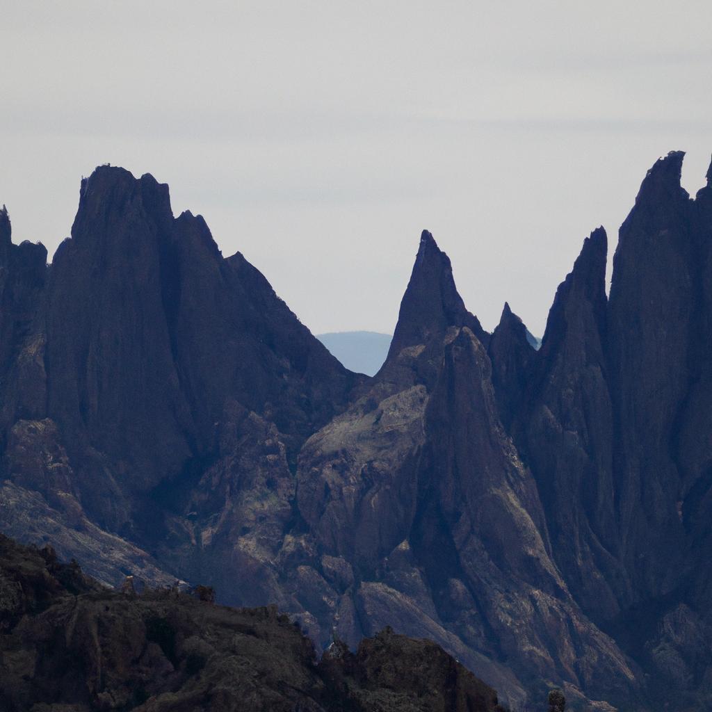The imposing presence of the giant-like peaks that guard the land