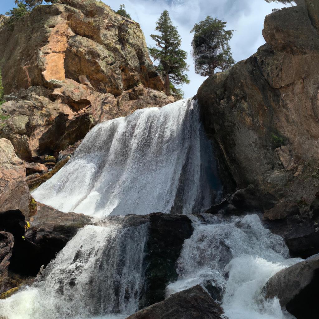 The sound of the waterfall in Boulder Village provides a peaceful ambiance for visitors.