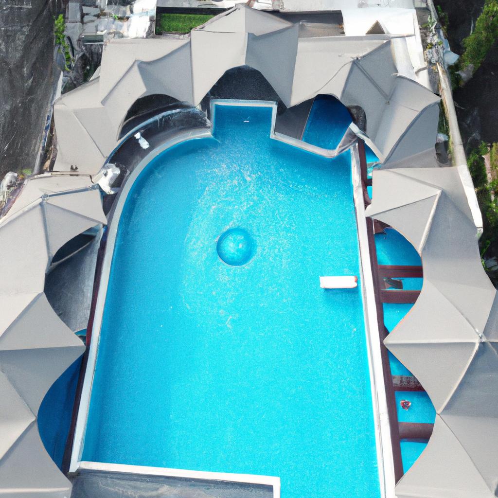 This massive residential pool features a unique shape and design that sets it apart from the rest.