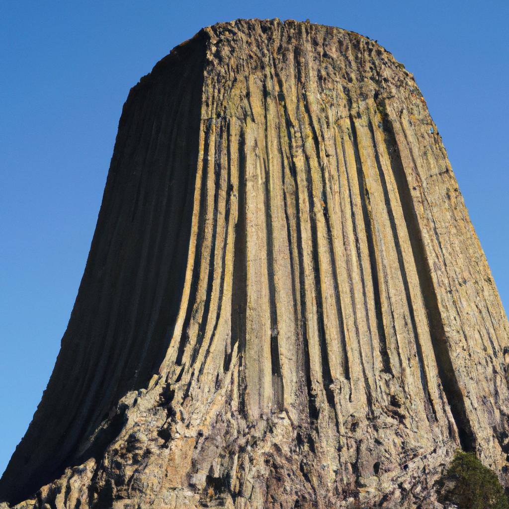 The Devils Tower Basalt against a blue sky is a breathtaking sight