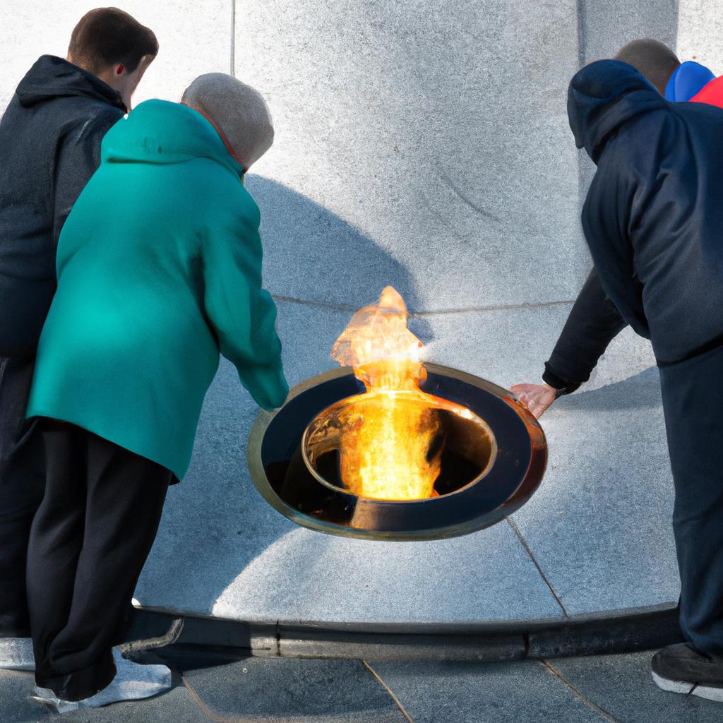People gathered around an eternal flame in Greece