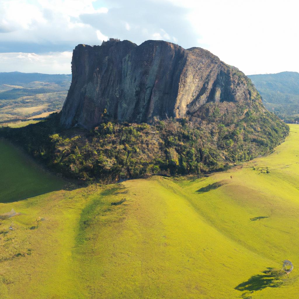 An aerial shot of Piedra del Peol showcases the stunning landscape and unique rock formation.