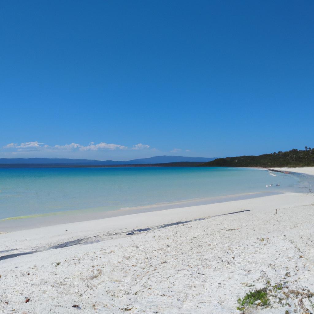 The crystal-clear waters and powdery white sand make the beaches of Crab Island Australia a perfect spot for relaxation.