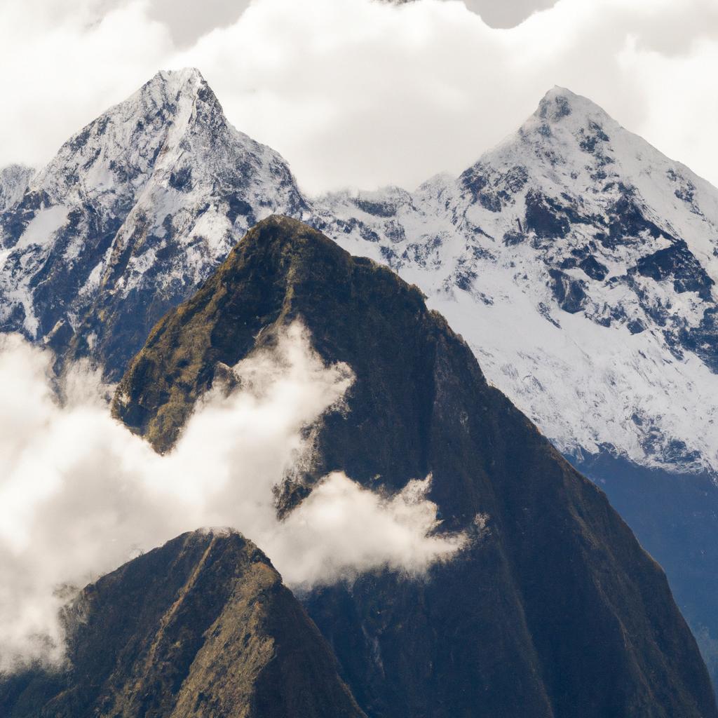 The majestic snow-capped peaks of Huayna Picchu mountain.