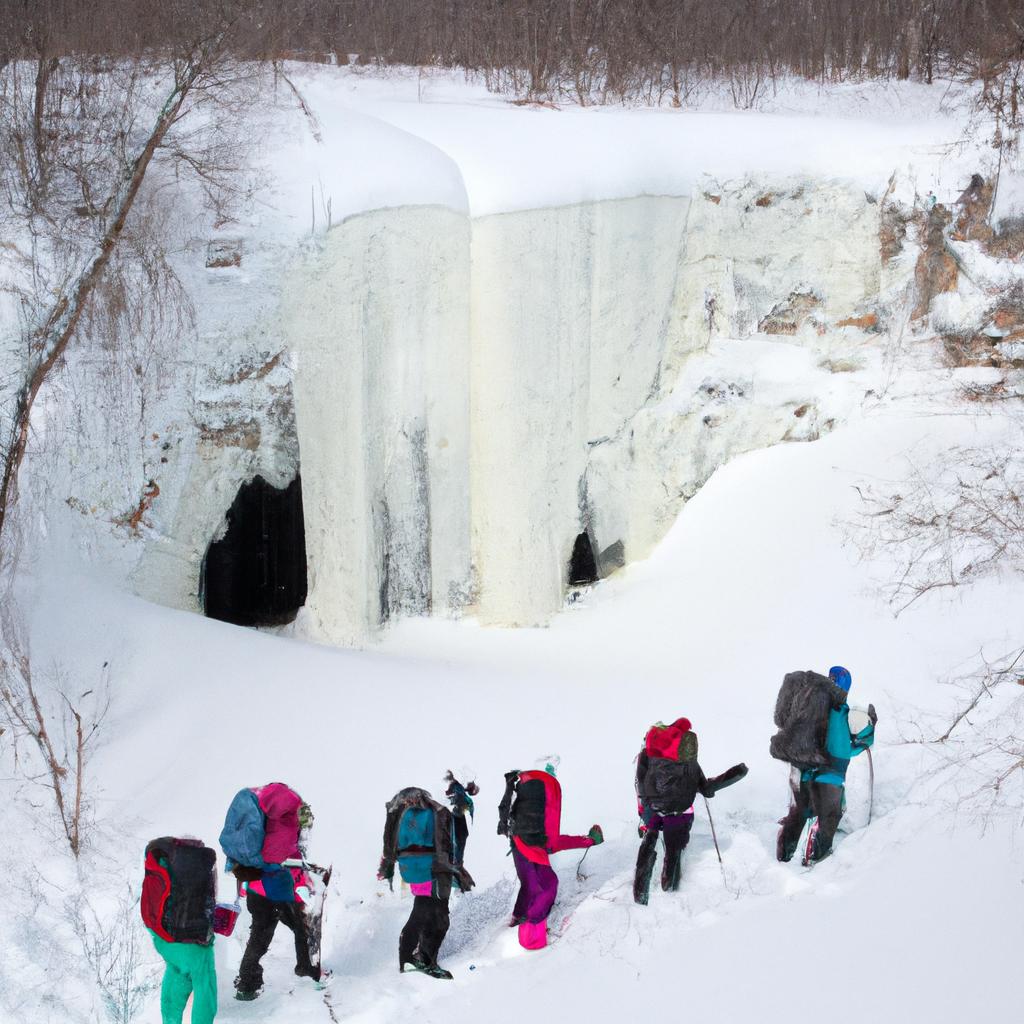 Snowshoeing to frozen waterfalls is a popular winter activity in Minnesota