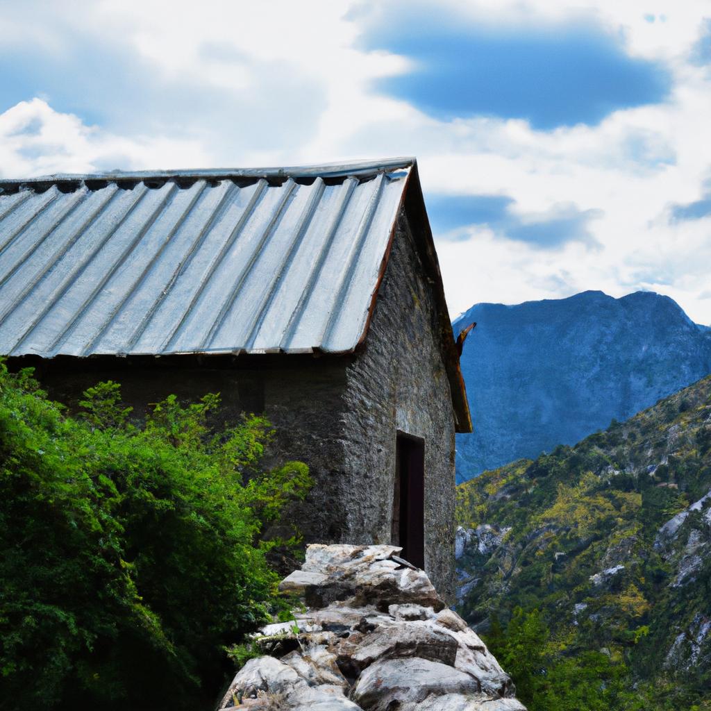This stone house offers a stunning view of the surrounding mountains.