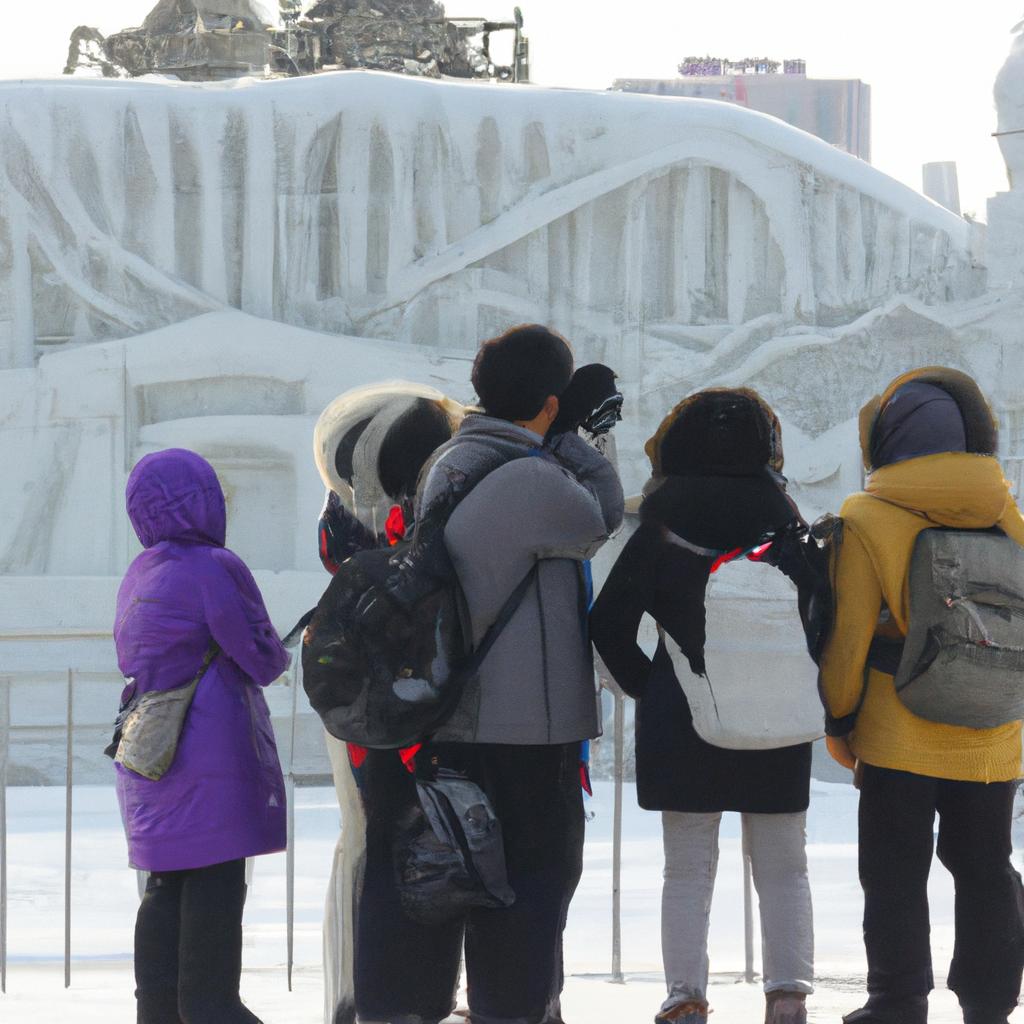 Tourists captivated by the beauty of an ice sculpture in Harbin.