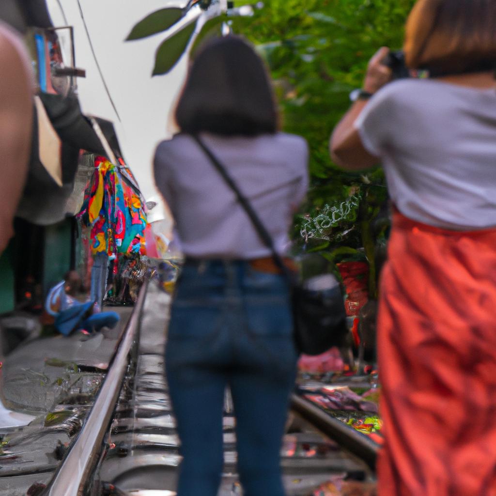 Don't miss the iconic train tracks at Bangkok Railway Market