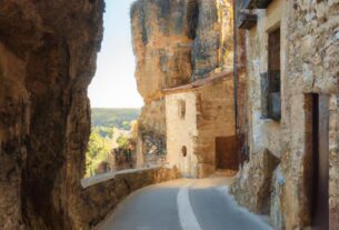 Town In Spain Under A Rock