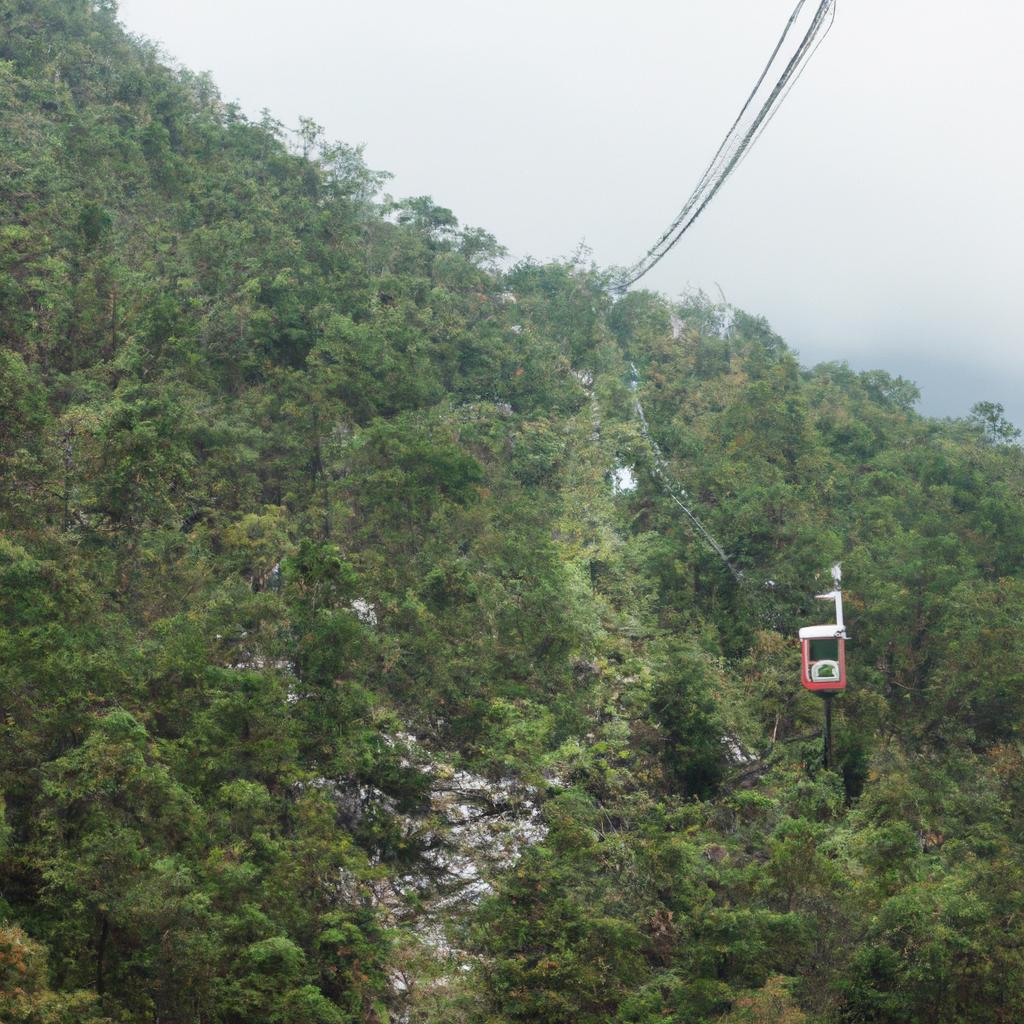 Experience the thrill of riding the winding cable car route in Vietnam, a must-see attraction for tourists.