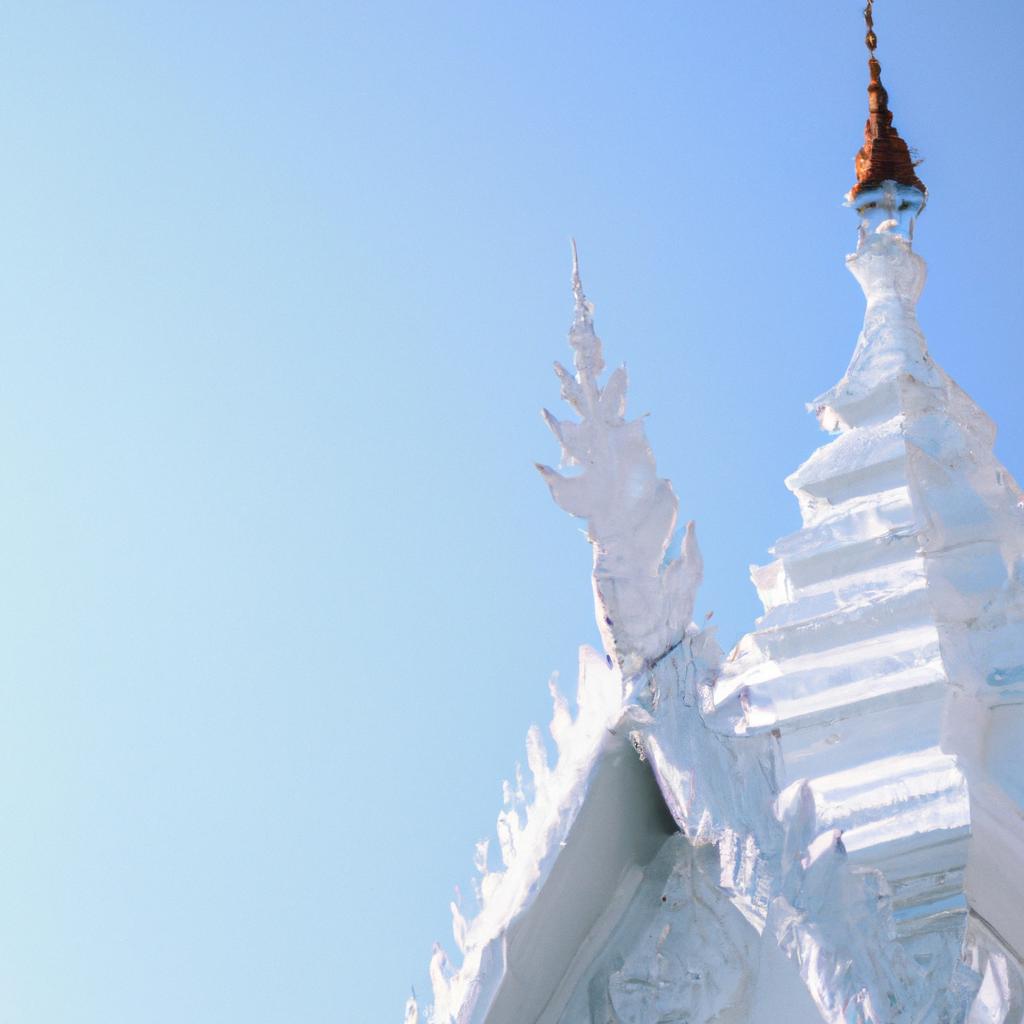 The White Temple's spire and rooftop are covered in intricate decorations and sculptures